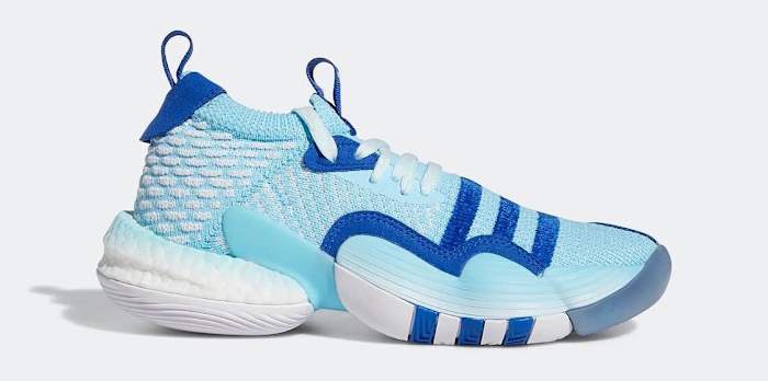 Side view of Trae Young's blue and white adidas shoe.